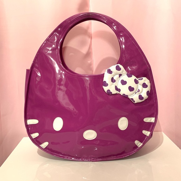 Sanrio Handbags - 2010 purple hello kitty Sanrio round tote